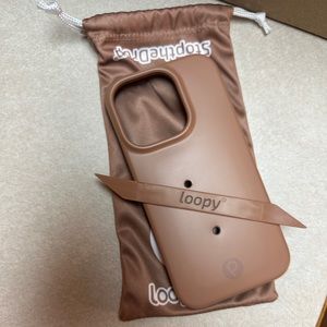 Loopy case - gently used  saddle brown  (retails for $43) for iPhone14pro(notMax